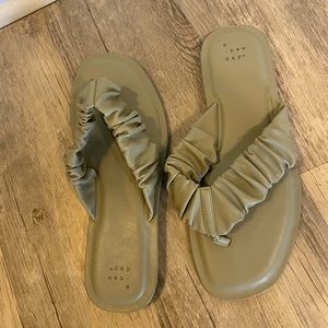 A. New Day Olive Sandals
